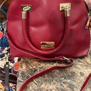 bebe Burgundy Satchel with Gold Accents